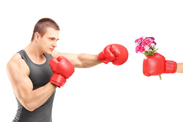 Poster - Male athlete with boxing gloves hitting a hand with boxing glove