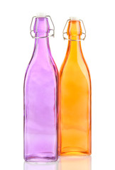 Poster - Empty color glass bottles, isolated on white