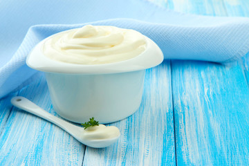 Sticker - Sour cream in bowl on table close-up