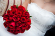 Bride Holding Red Rose Bouquet