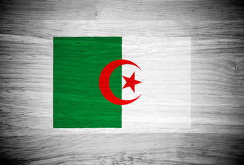 Algeria flag on wood texture