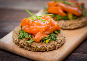 Canapes with smoked salmon and herbs