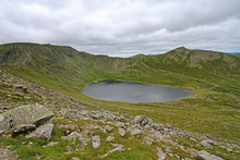 Helvellyn And Red Tarn In Lake District, England, United Kingdom