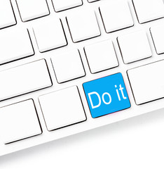 Fototapete - Closeup of a computer keyboard with empty keys and word Do it, w