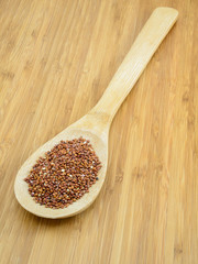 Wall Mural - Raw Quinoa in Wooden Spoon