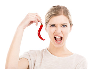 Canvas Print - Beautiful woman holding a red chilli pepper