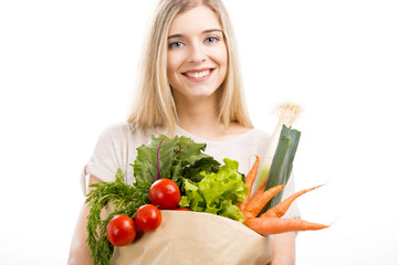 Canvas Print - Beautiful woman carrying vegetables