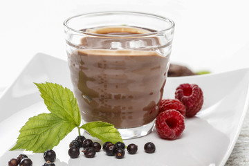 Wall Mural - Chocolate dessert decorated with fresh raspberries