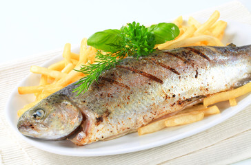 Canvas Print - Grilled trout with French fries