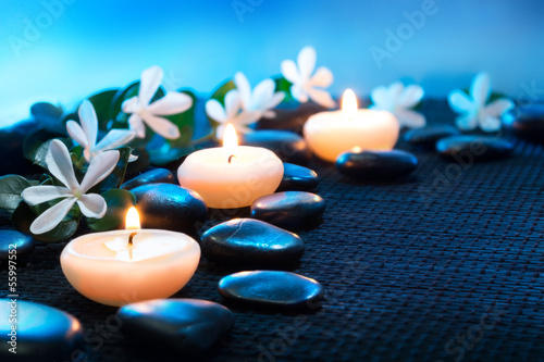 Naklejka na kafelki candles and black stones on black mat