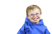 Little Boy With Downs Syndrome And Very Happy Smile