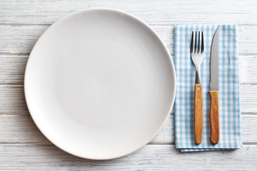 Wall Mural - white plate with fork and knife