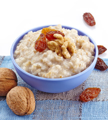 Wall Mural - Bowl of oats porridge