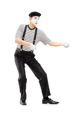 Sticker - Male mime artist performing pulling virtual rope