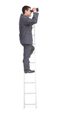 Poster - Businessman standing on ladder using binoculars