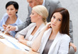 © Karramba Production - Business people at the presentation discuss current issues