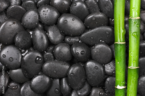 Naklejka - mata magnetyczna na lodówkę Hot stones with bamboo, background