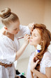 © Miramiska - Stylist makes makeup bride on the wedding day