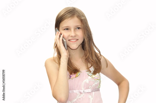 Mädchen beim telefonieren Stock-Foto | Adobe Stock