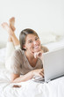 © tmc_photos - Beautiful Girl With Laptop Lying In Bed