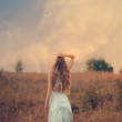 © VectorART - blond girl with beautiful hair enjoys the freshness