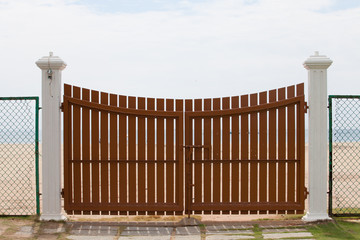 wooden gate with sea background