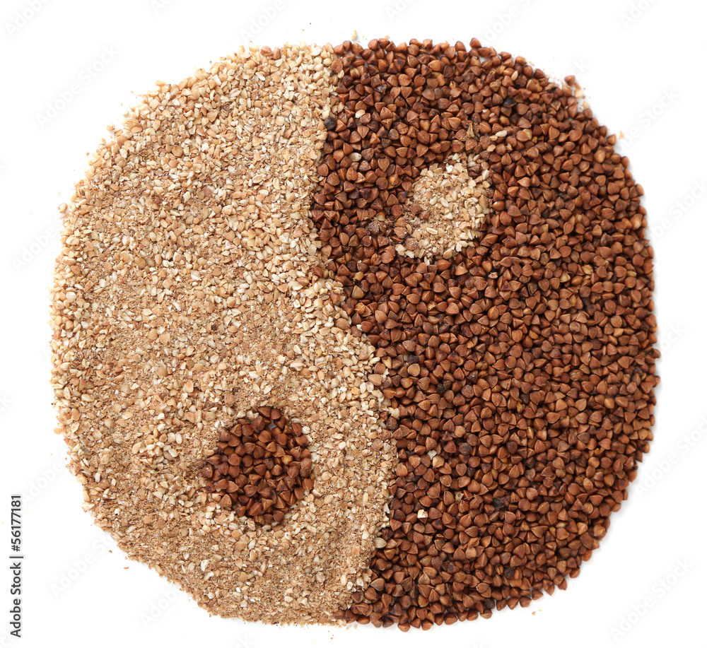 Buckwheat groats and flour isolated on white