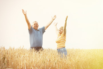 Old people over field background