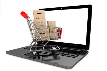 Poster - Online shopping concept. Shopping Cart with Boxes over Laptop