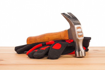 Wall Mural - hammer and gloves on table