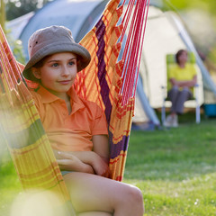 Wall Mural - Summer in the tent -  girl with family on the camping