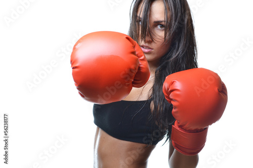 Foto beautiful woman with the red boxing gloves, isolated on white