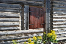 Shutters Of A Vintage Rustic Log Cabin Window