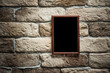 © vlntn - photo frame on brick wall