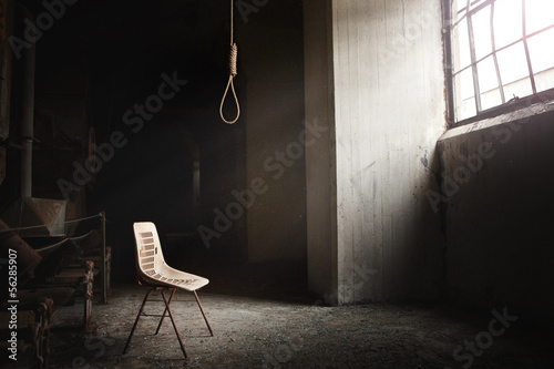 Fotografie, Obraz Hangman Noose with thirteen loops setup in an abandoned building
