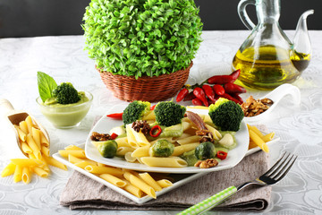 Wall Mural - Pasta with broccoli cream and nuts