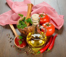 Wall Mural - Olive oil, vegetables and spices