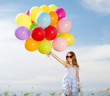 © Syda Productions - happy girl with colorful balloons