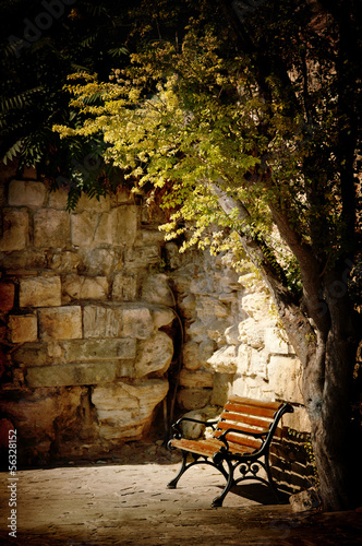 Naklejka nad blat kuchenny benc, tree and old stone wall