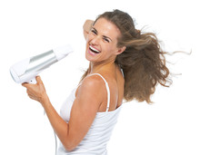 Portrait Of Happy Young Woman Blow-dry