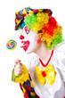 © Elnur - Clown with lollipops isolated on white