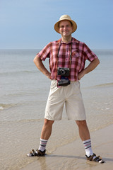 tourist standing on the beach