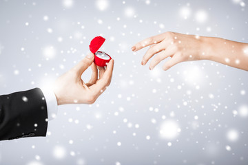 couple with wedding ring and gift box