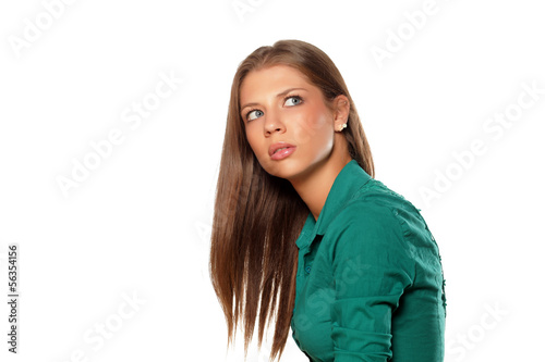 Fotografia, Obraz young attractive girl looking unclear at someone