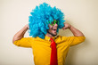 © Eugenio Marongiu - crazy funny young man with blue wig