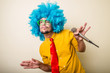 © Eugenio Marongiu - crazy funny young man with blue wig
