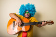 © Eugenio Marongiu - crazy funny young man with blue wig