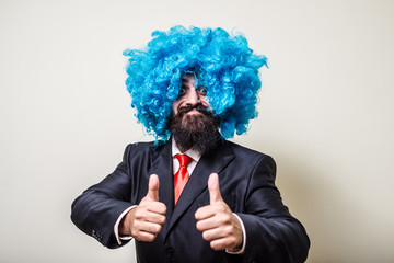 Wall Mural - crazy funny bearded man with blue wig