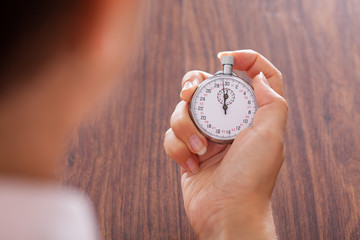 Stopwatch In Female Hand