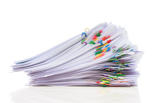 Pile Of Paper With Colorful Clips